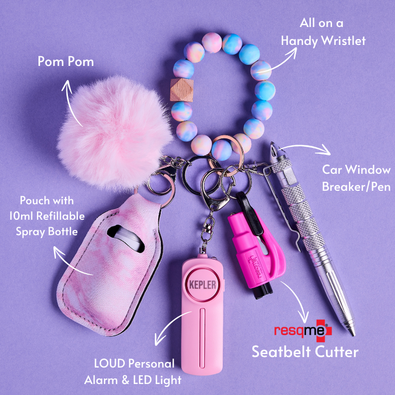 Pink Safety Keychain set with various safety tools on a purple background