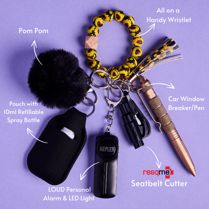 Sunflower safety Keychain with various safety tools on a purple background